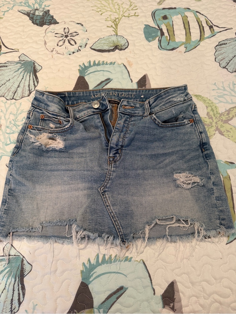 American Eagle Outfitters Distressed Light Blue Denim Mini Skirt